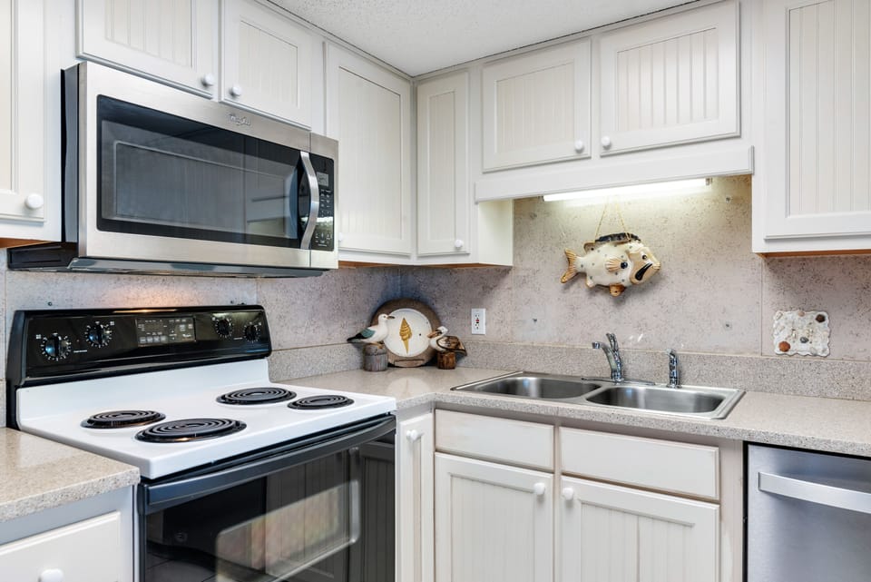 Fully Equipped Kitchen, recently upgraded with Stainless Steel Appliances, Custom Cabinets and Granite Counter Tops