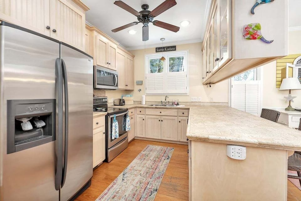 Modern kitchen with stainless steel appliances and a kitchen peninsula