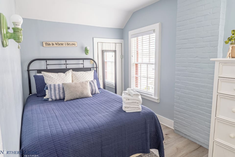 Second level bedroom with a full bed