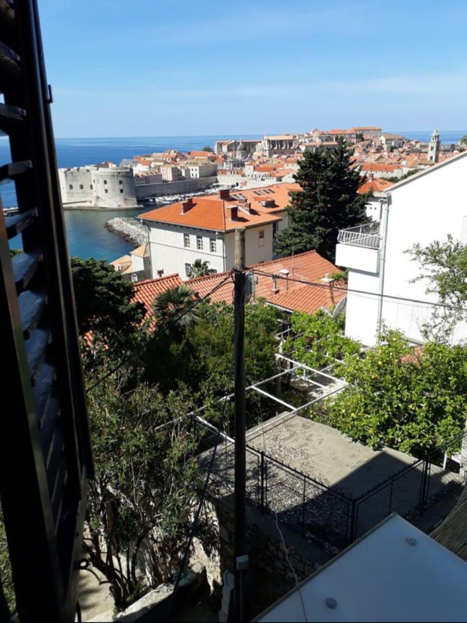 The bedroom overlooking to the sea and the Old Town