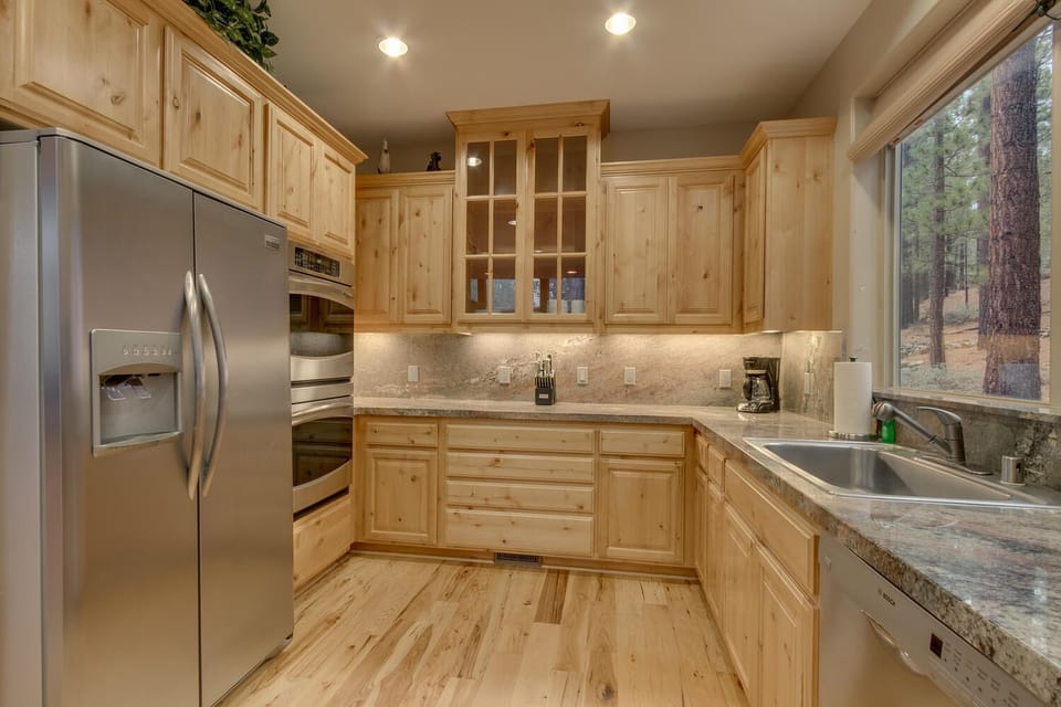 - Fully equipped kitchen with stainless appliances  
- Granite counters and custom wood cabinetry  
- Tahoe cabin with everything for home cooked meals
