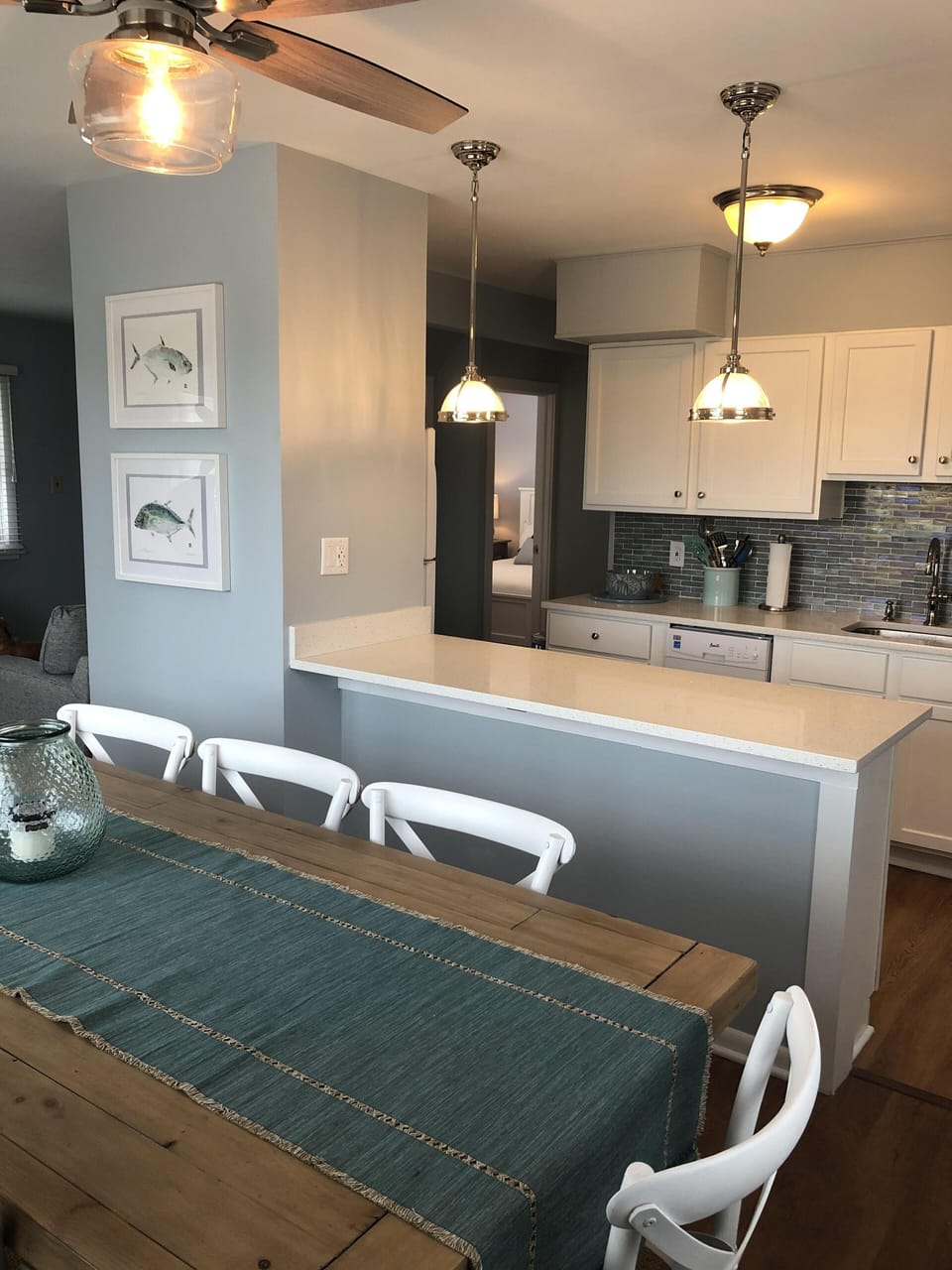 Open concept living, dining and kitchen areas.