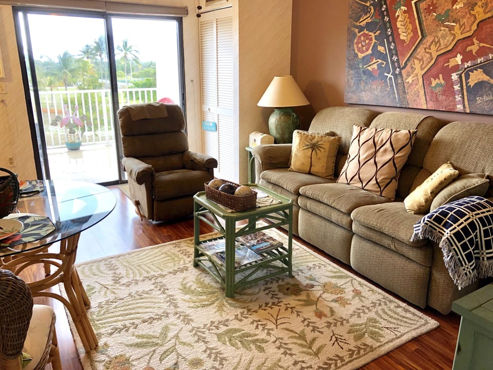 Loft area opens onto the balcony overlooking the park. 