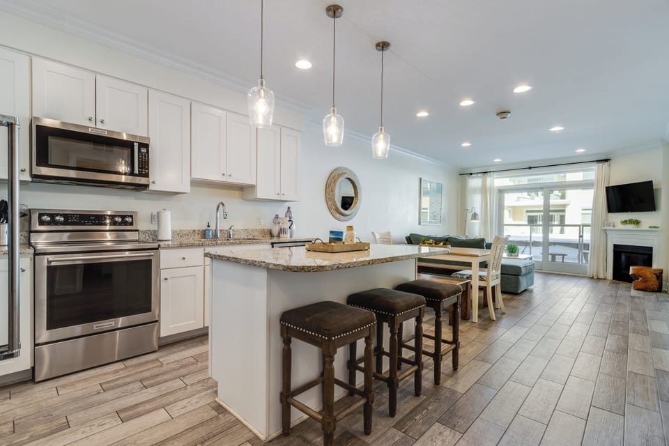 Spacious kitchen with island and extra seating.