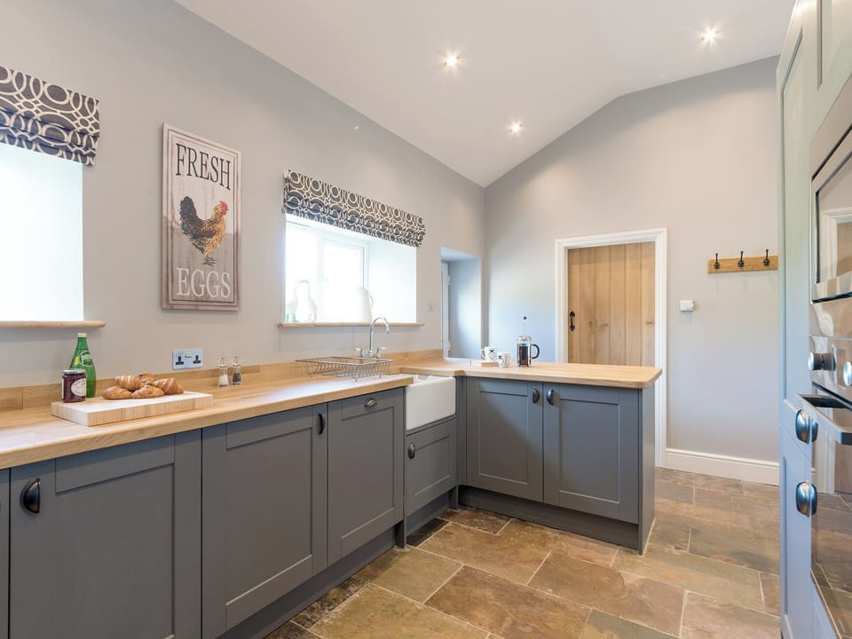 Spacious kitchen with breakfast bar | Abraham&rsquo;s Cottage, Langthwaite, near Richmond