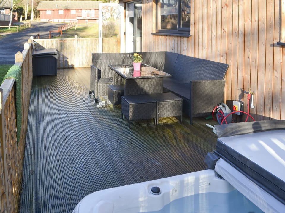 Outdoor area with hot tub | The Hideaway, Otterburn, near Bellingham