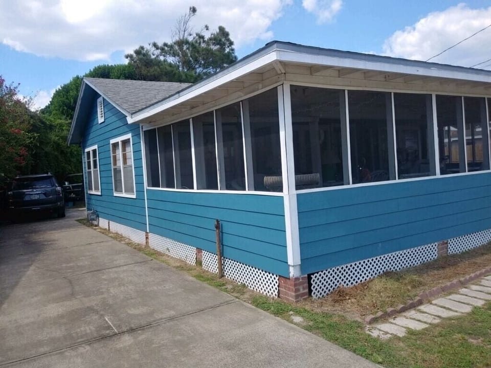 Left side with driveway