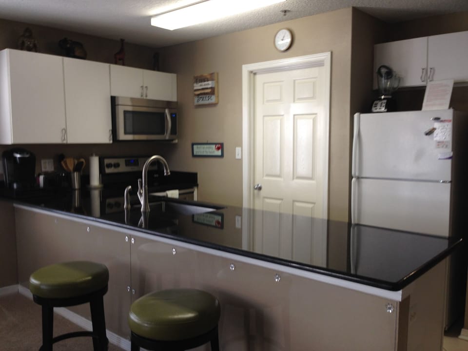 Fully equipped kitchen ready for you to move in.