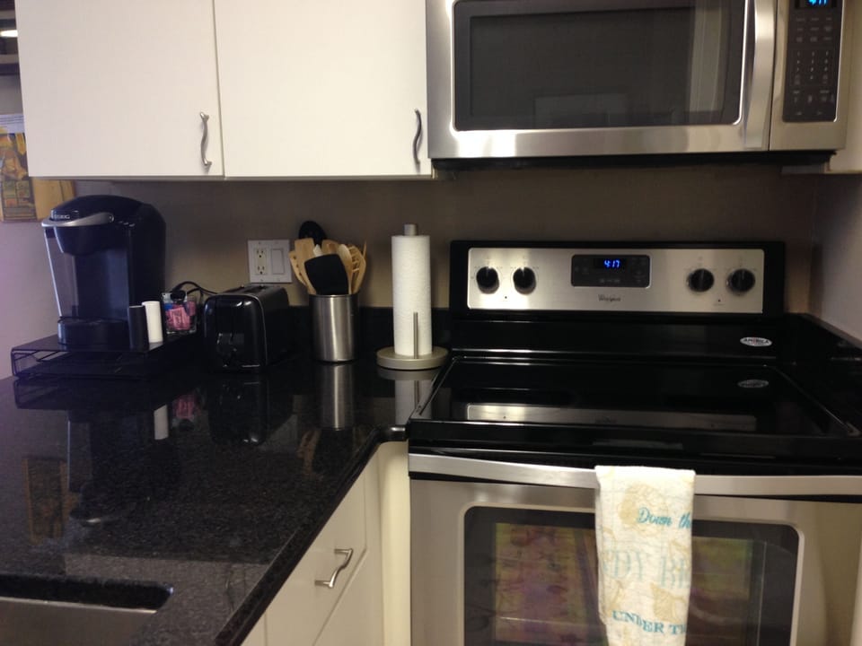 Granite counters, stainless stove/microwave & Keurig coffee maker. 
