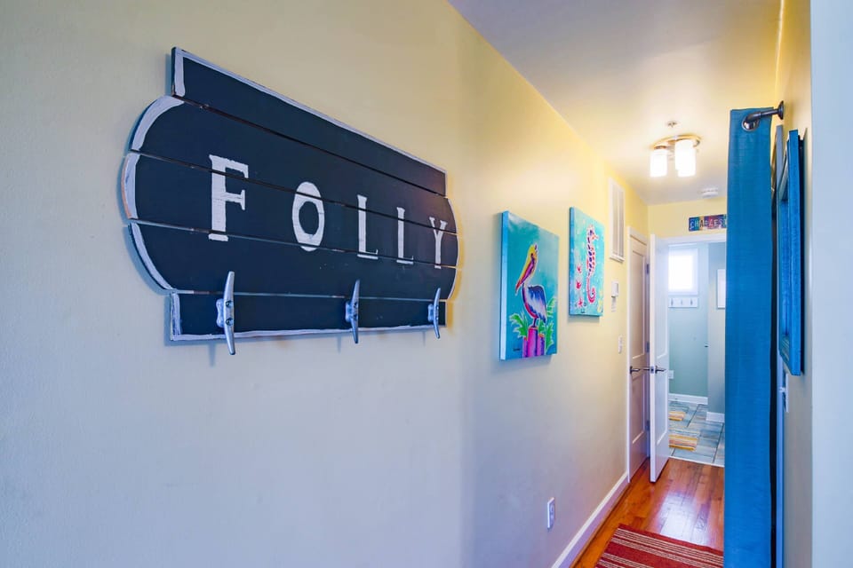 This hallway off of the kitchen leads to the bedroom, bathroom & laundry closet.