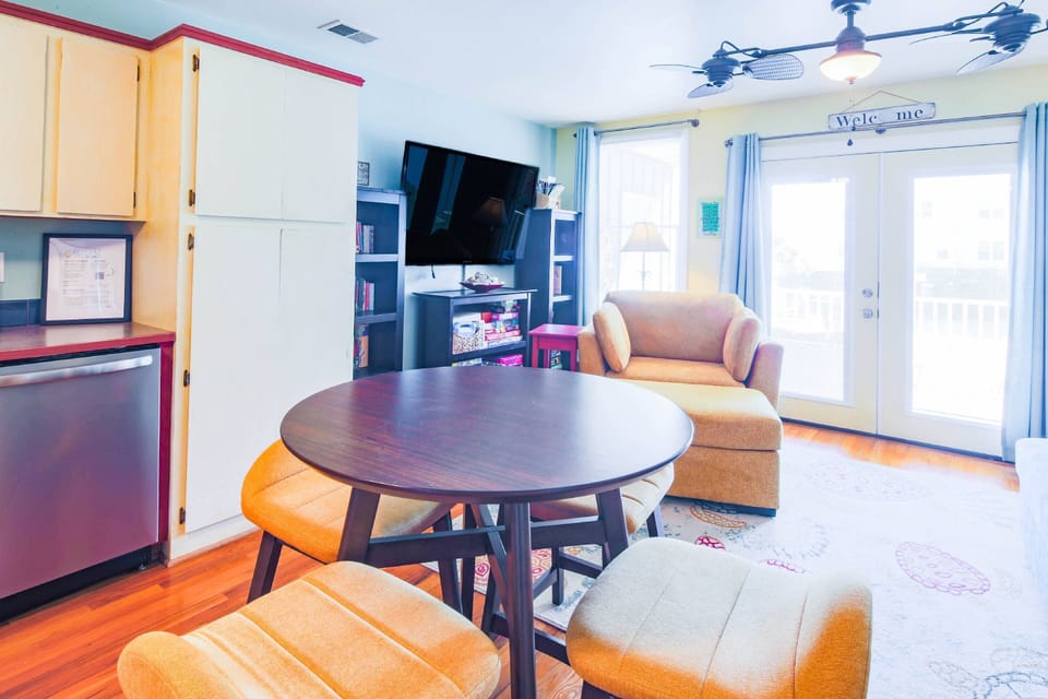 There is an open floor plan layout between the living room, dining area and kitchen.