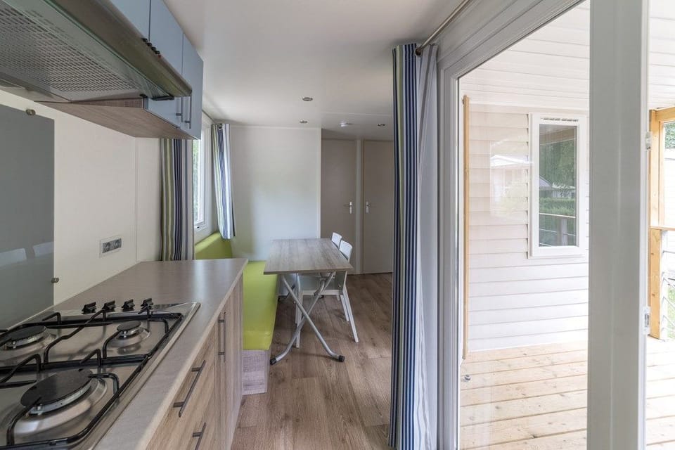 Curb your appetite by cooking a meal in your kitchen.