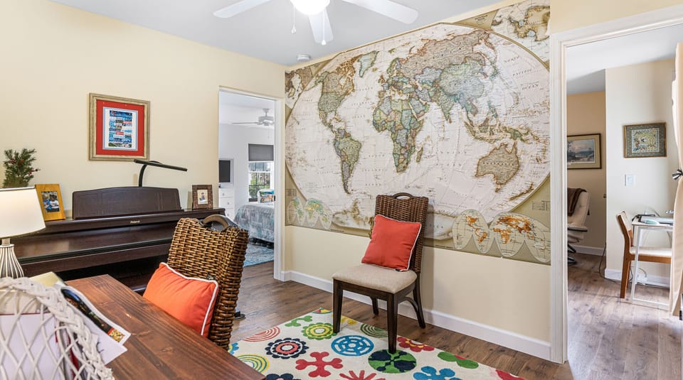 Office just outside of guest room with twin beds