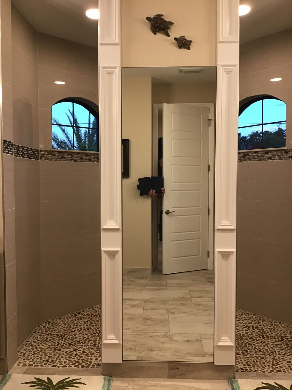 Master bedroom en-suite with spacious walk through rain and front showers.