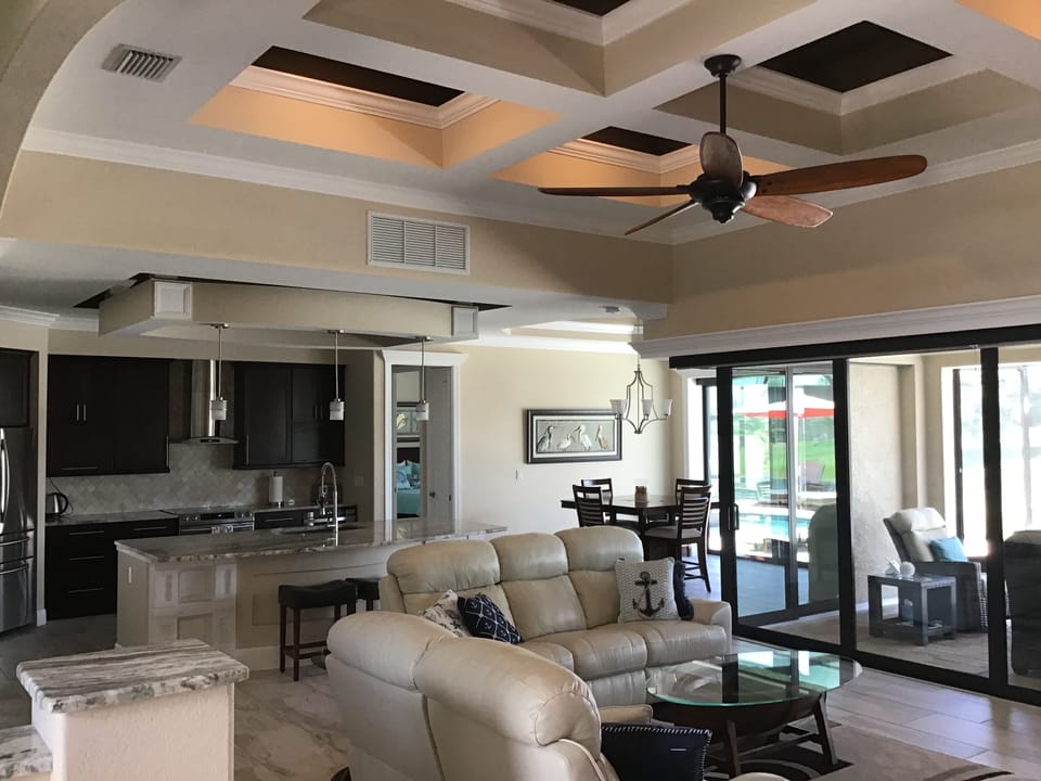 This house has spectacular 3D coffered ceilings with subtle up lighting.