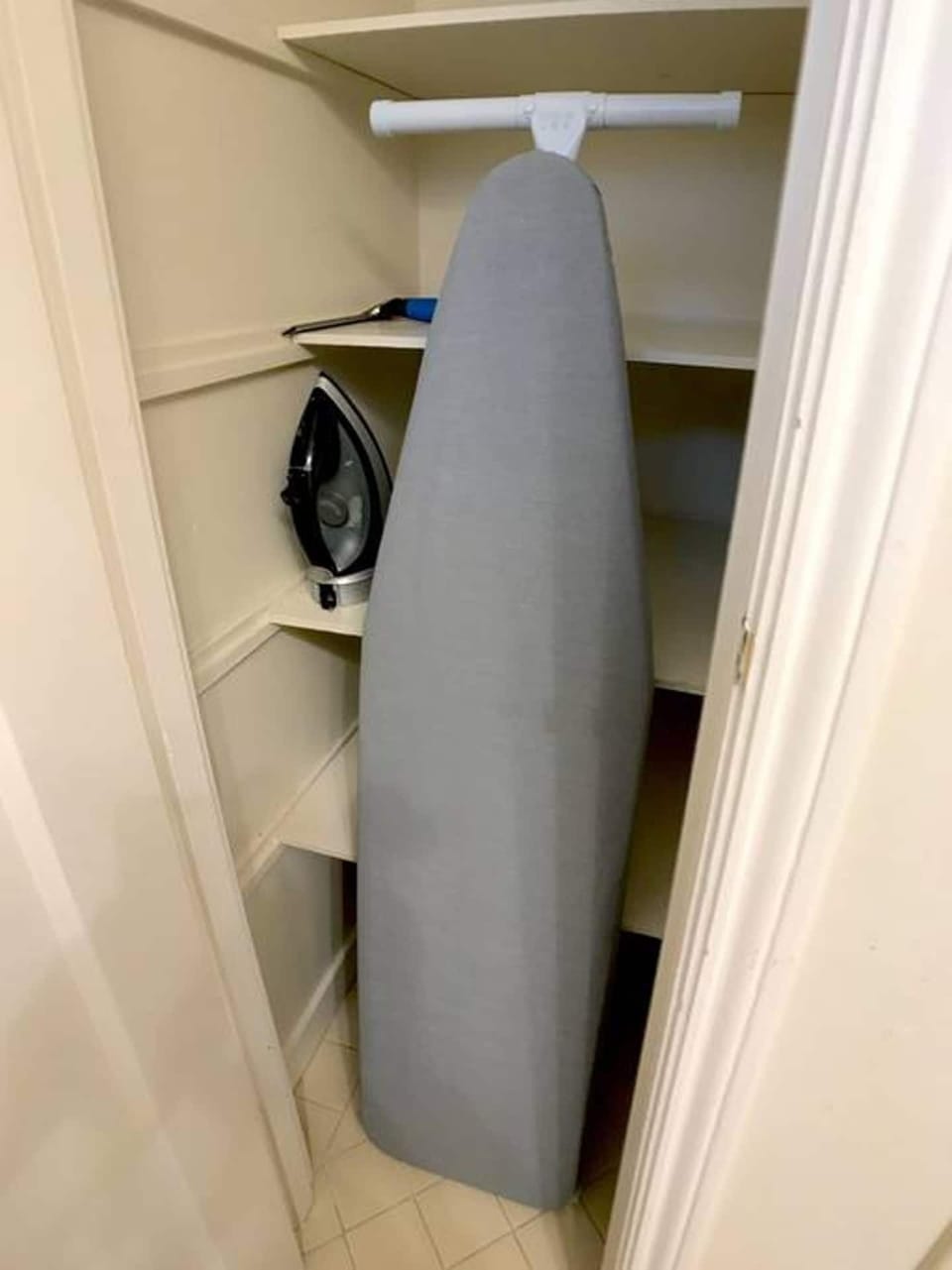 Full size ironing board with iron...