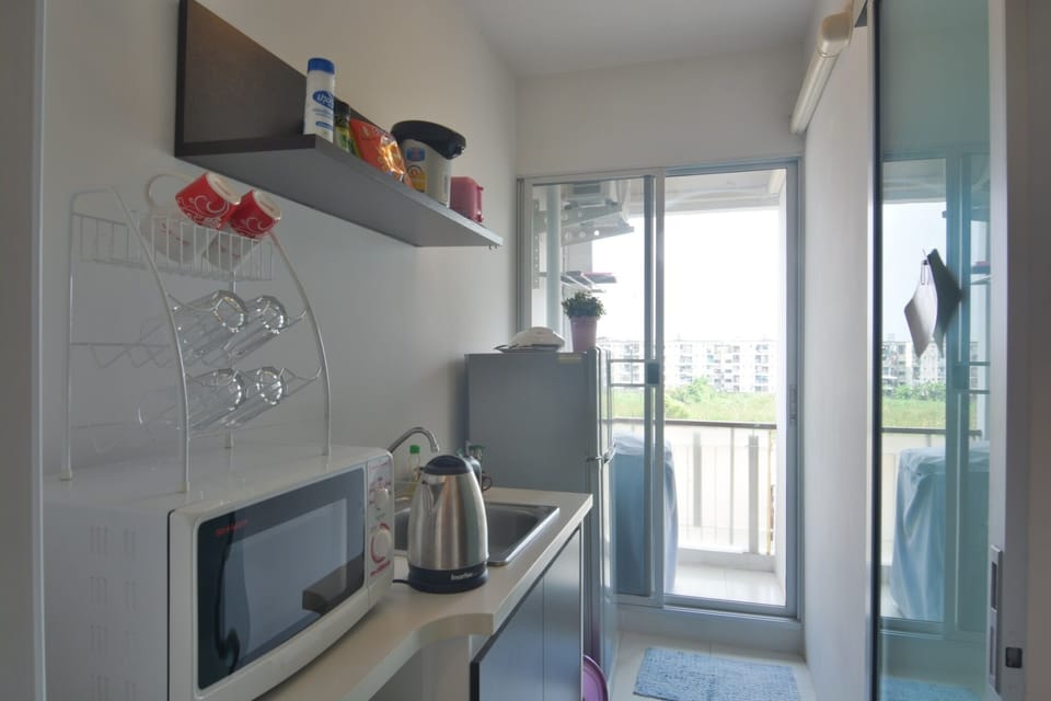 small kitchen with appliances. 