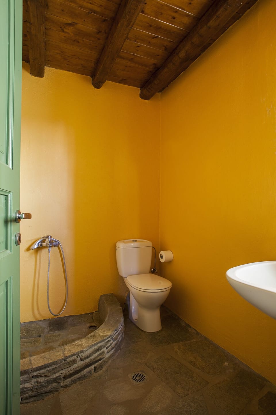 guest house-orange bathroom