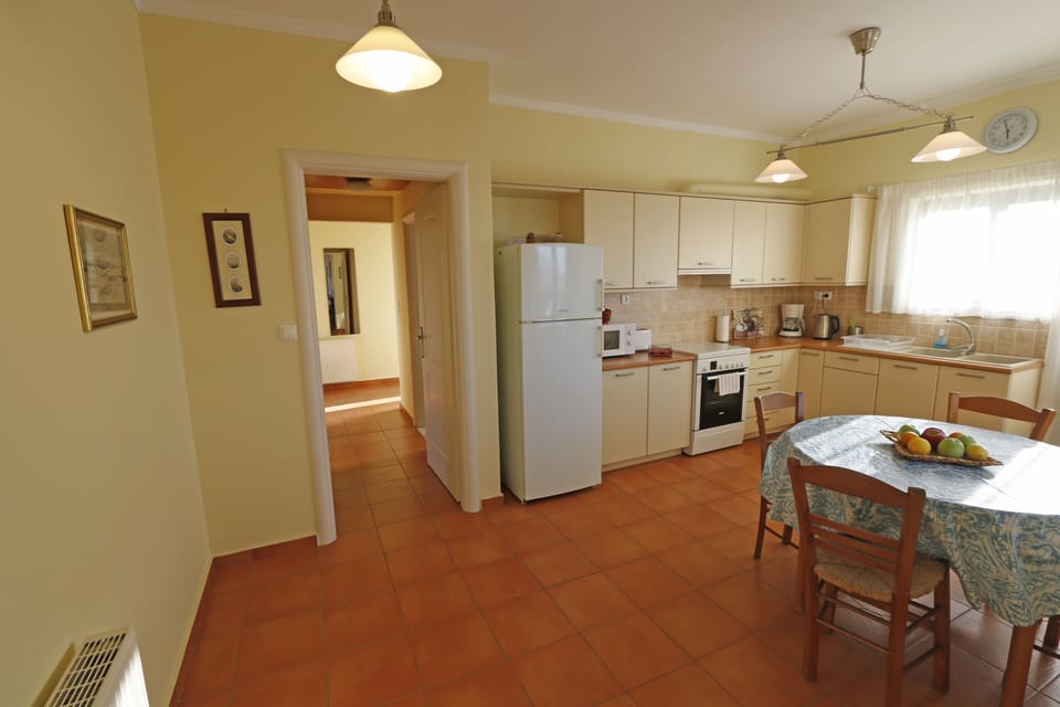 Kitchen with corridor leading to the bedrooms