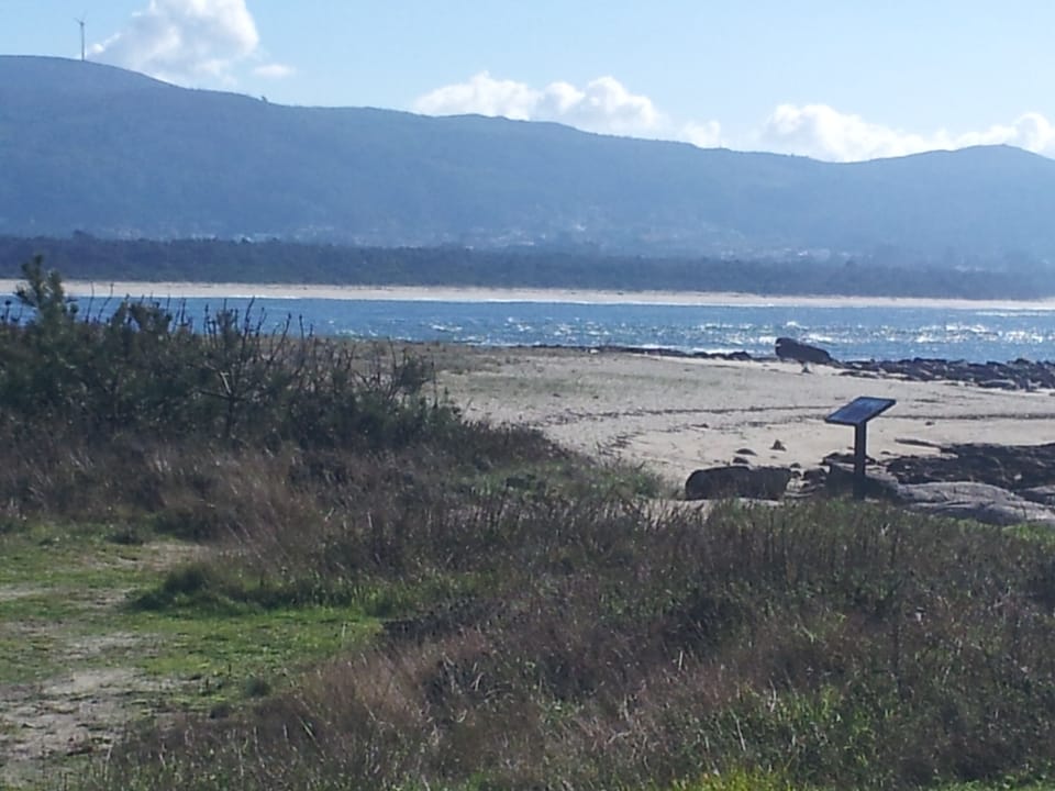 Mouth of the Minho Estuary where sandy beaches and rock pools abound.  