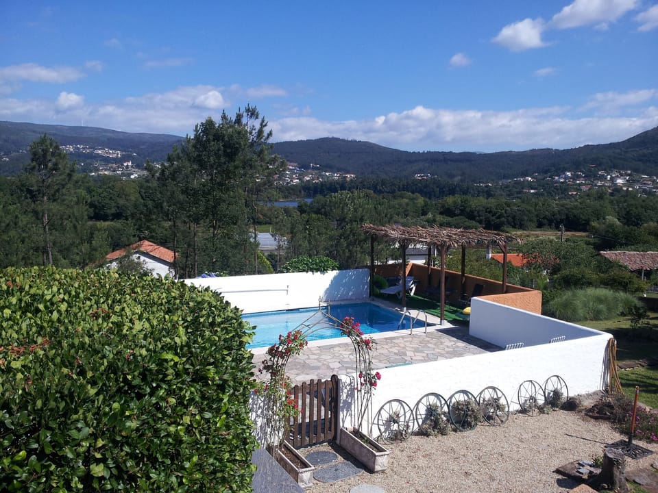 Pool estuary and Portuguese hills from Lodge terrace