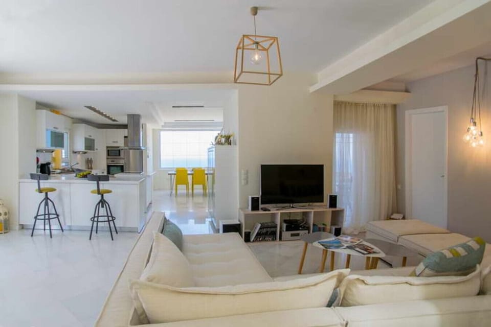 Airy open-plan living with a stylish kitchen.