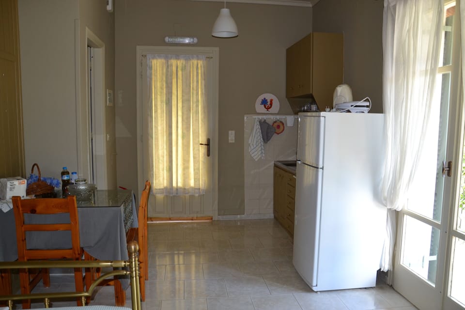 The room with the double bed has a kitchenette with full size refrigerator. 