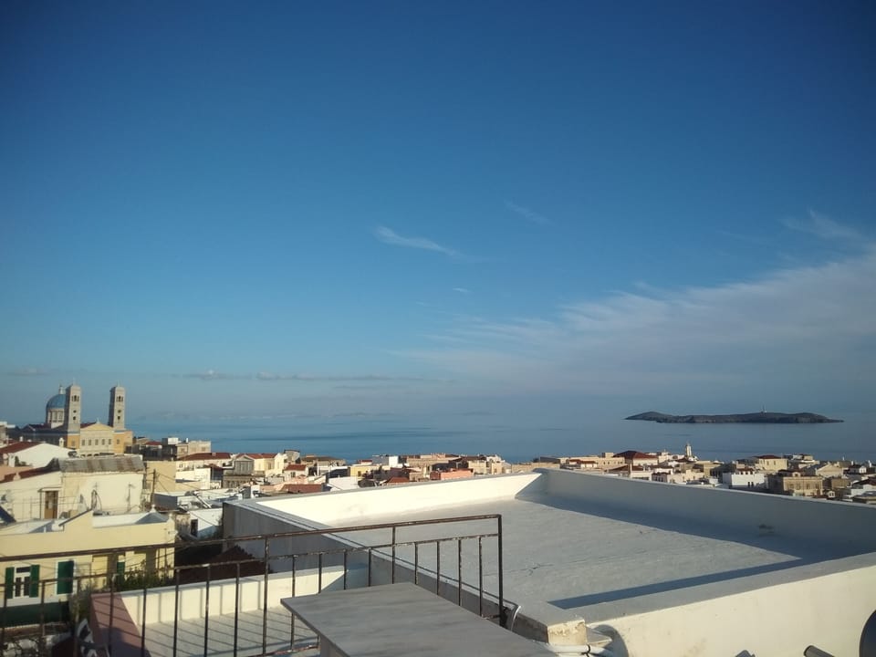view from the rooftop with seating area 