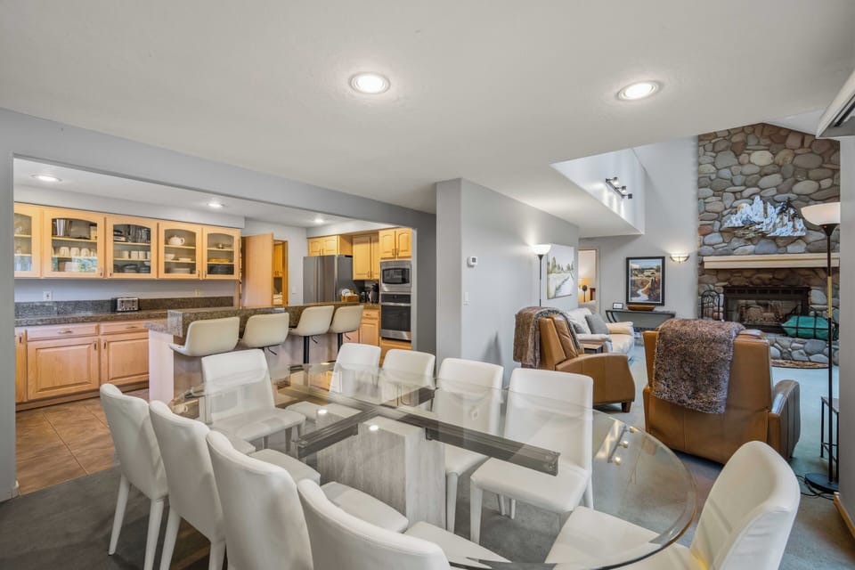 Your spacious open-concept retreat flows seamlessly from dining to kitchen to living room, creating perfect gathering spaces.