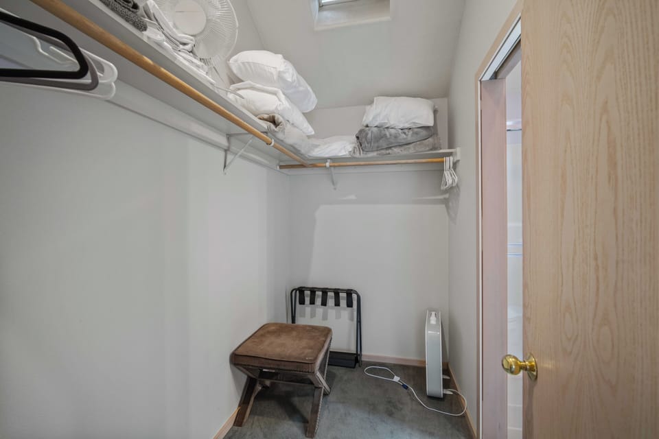 Your walk-in closet provides ample hanging space and shelving for all your belongings, keeping everything organized during your stay.