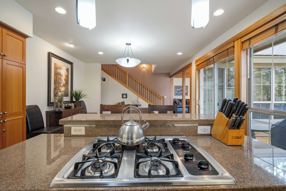 Your gourmet kitchen features granite counters, gas cooking, and knife set—perfect for preparing memorable meals together.