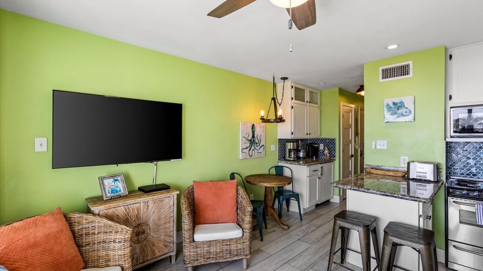 Movie night or game night—enjoy the Smart TV plus board games stored in the TV stand at this front-facing Galveston beachfront condo.