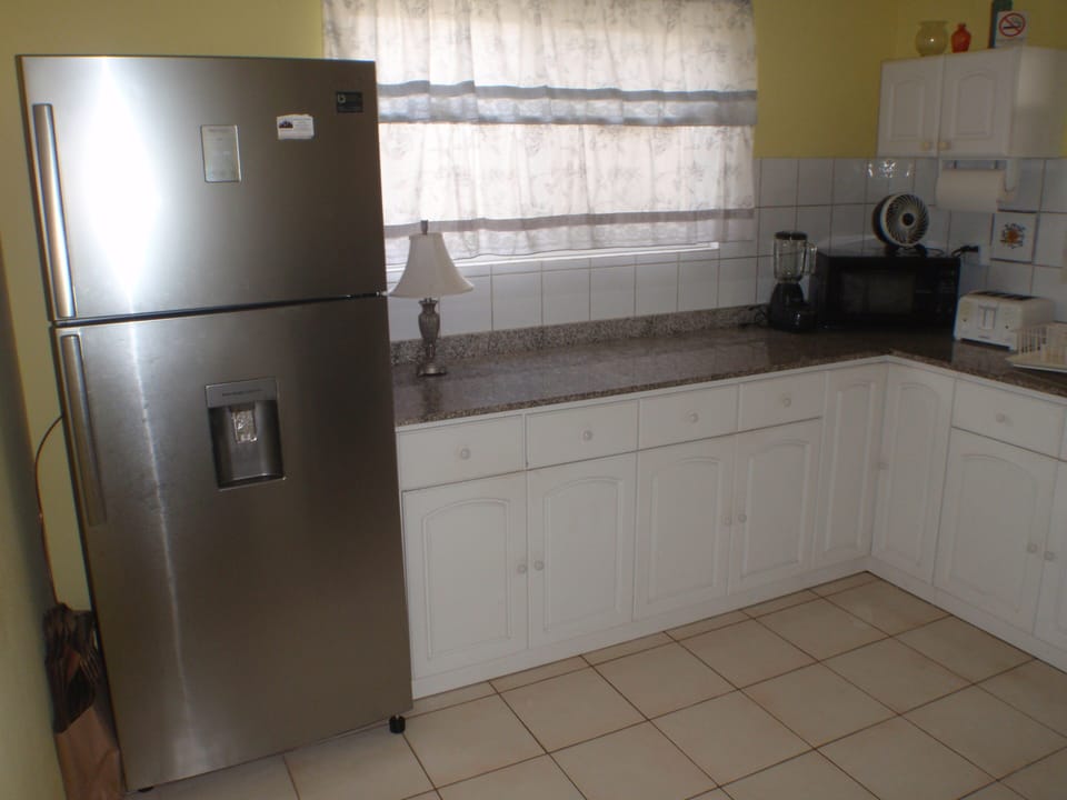 This home has 2 kitchens, 2 refrigerators, 2 stoves.   Large home for 14 people