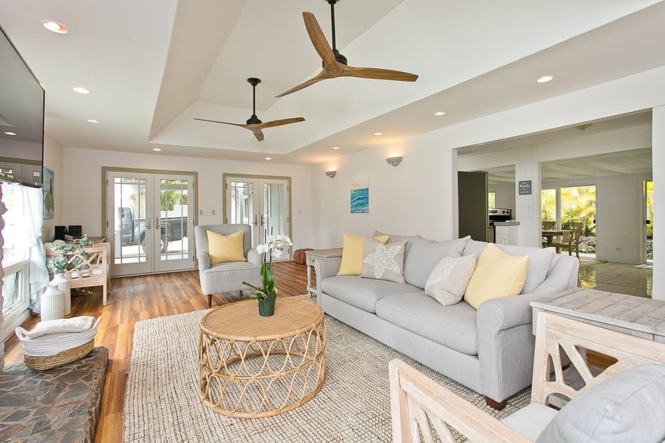 Open living room with TV, DVD, stereo, phone and wifi.