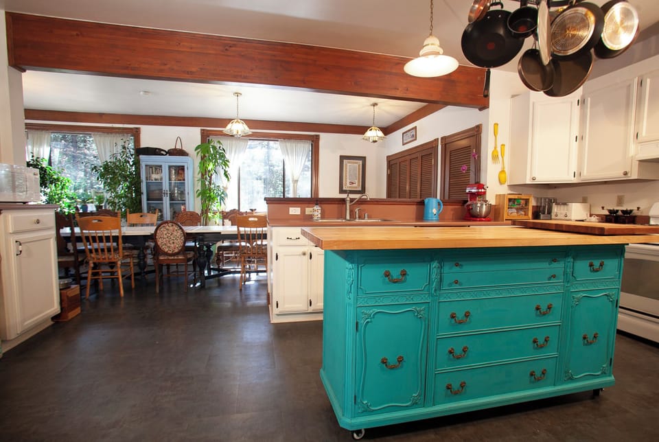 Kitchen view from entry door. Dining area in view