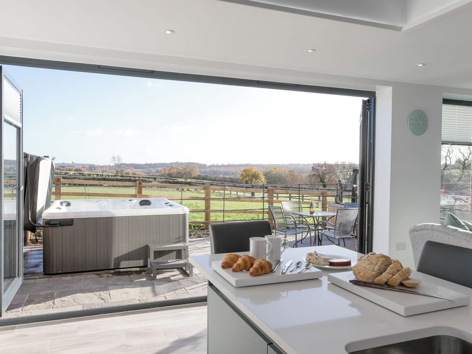 Bi-fold doors to patio area | The Retreat - Broadstone Barns, Ticknall, near Derby