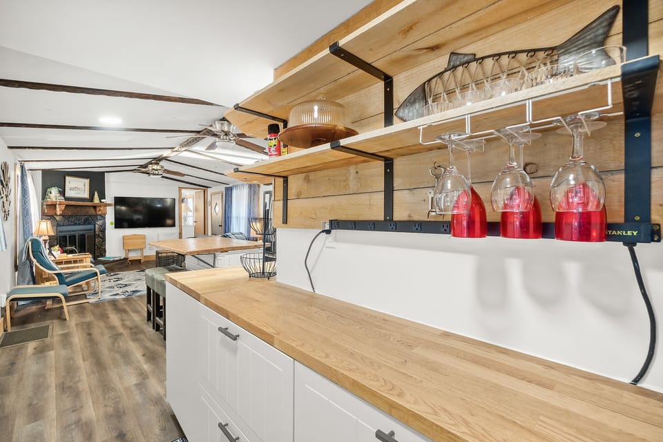 Extra outlets. Great spot for a bar!  Four drawers for ample pantry. 
