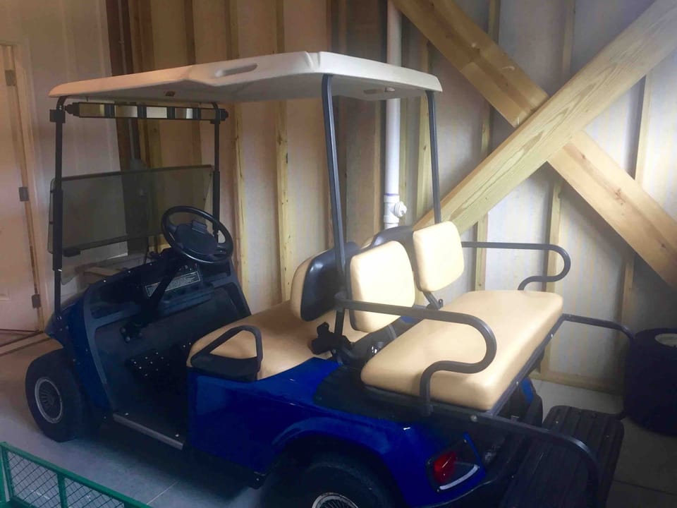 Golf Cart included with your rental!  Get all your gear to the beach easily!