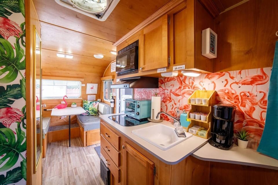 The kitchenette comes equipped with everything you need to prepare a small meal.