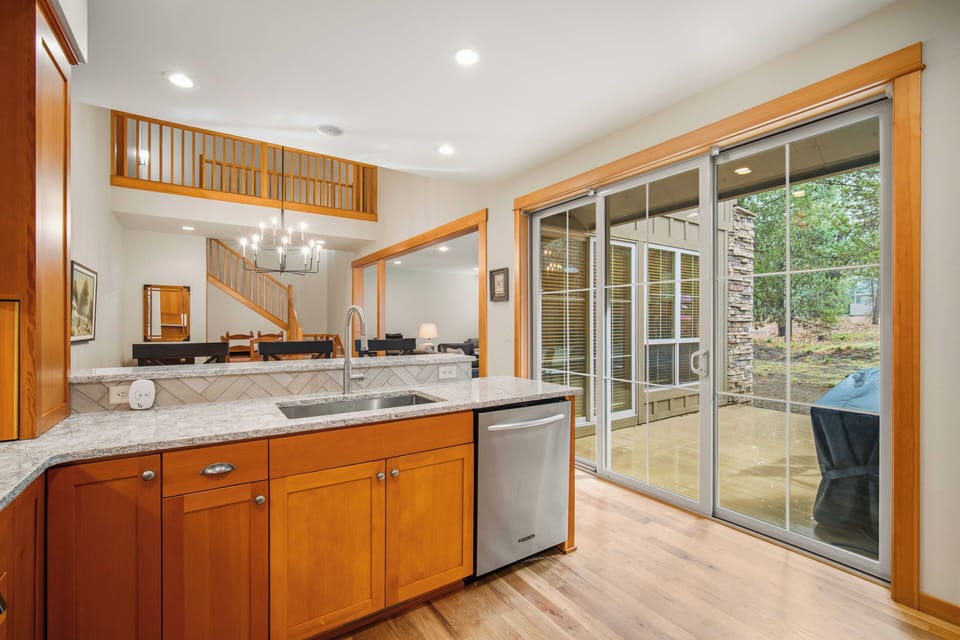 Your walk-in closet offers organized wire shelving, a mounted TV for getting ready, and ample space for all your belongings.