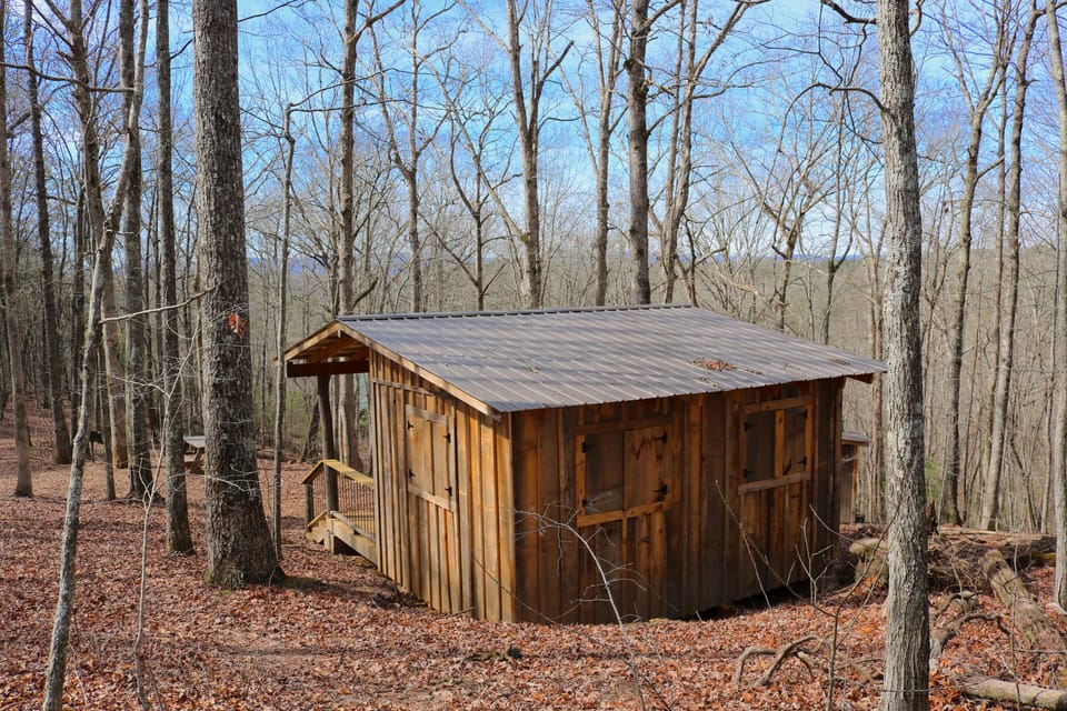 the site is tucked away on top of the hill and borders 140 acres of wilderness