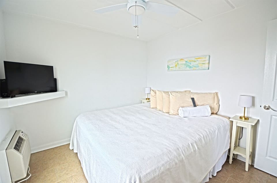 Bedroom with king bed, HD cable TV, black out drapes and great ocean views.