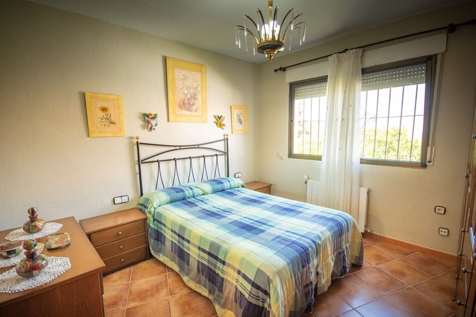 Enjoy the bedroom of this country house in Alhaurín el Grande