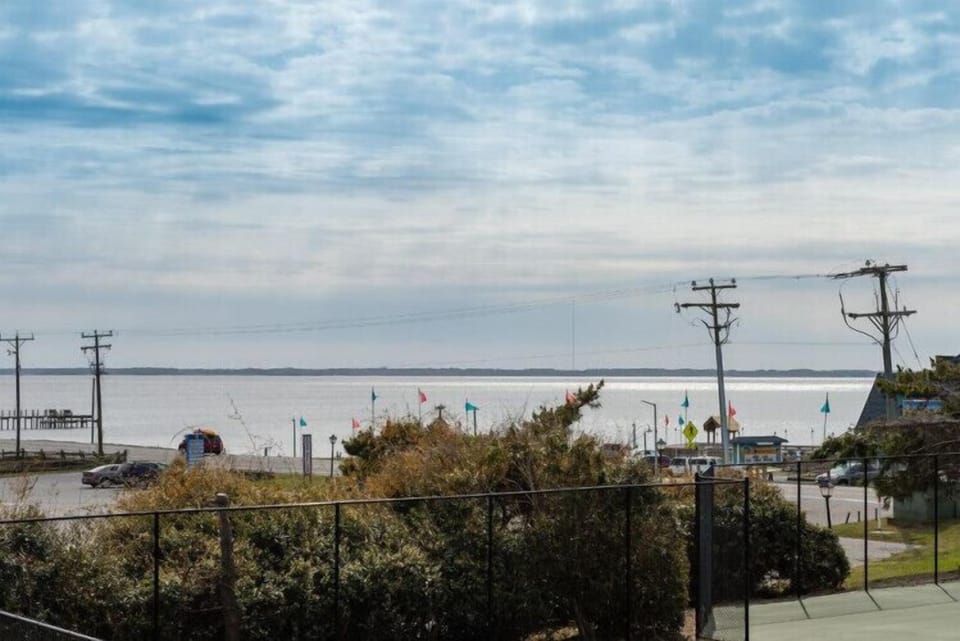 Waterfront location offering easy access to the bay and local attractions, visible from the property surroundings.