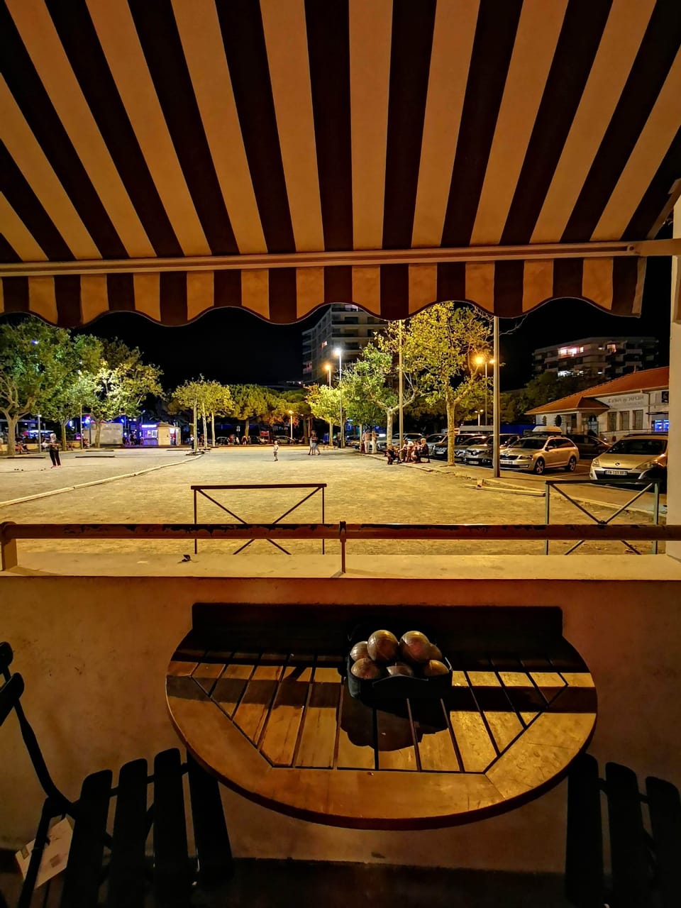 Petanque court view from the balcony; lowering the awning offers full privacy.