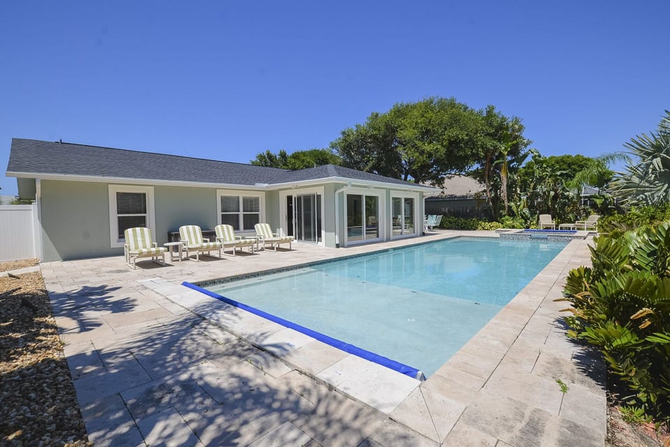 Sunbathing, shallow area of the pool