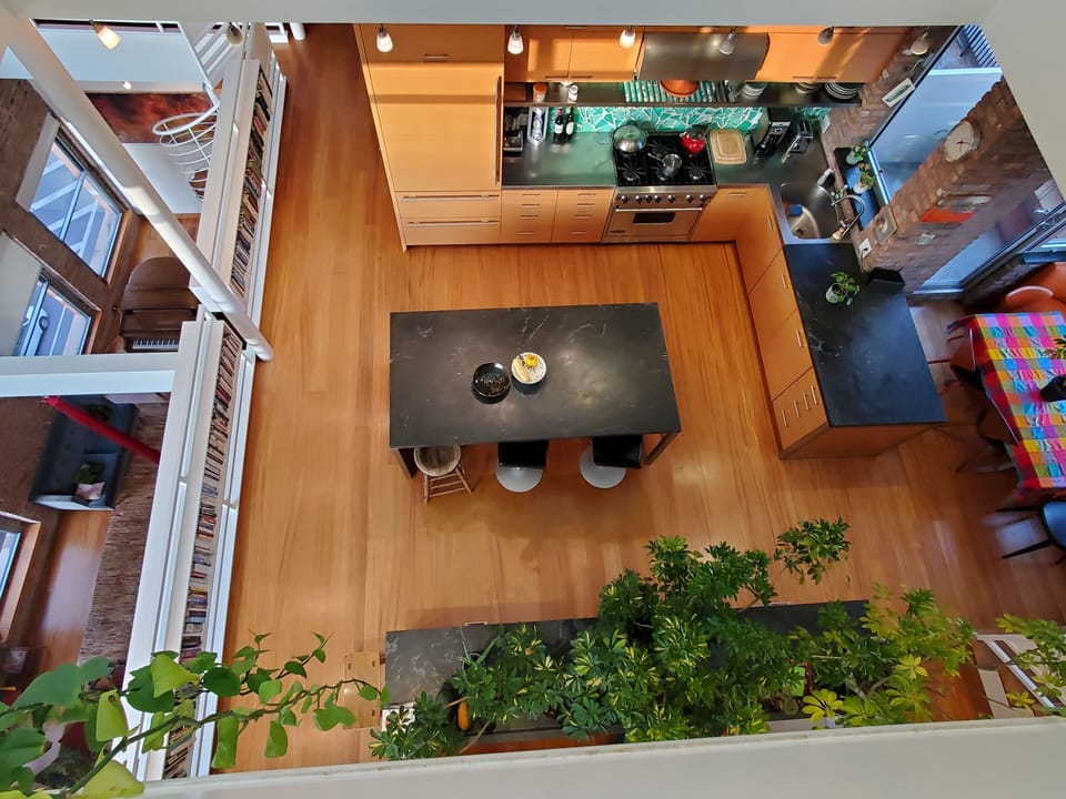 View from 7th floor showing 5th floor to the left and 6th floor kitchen