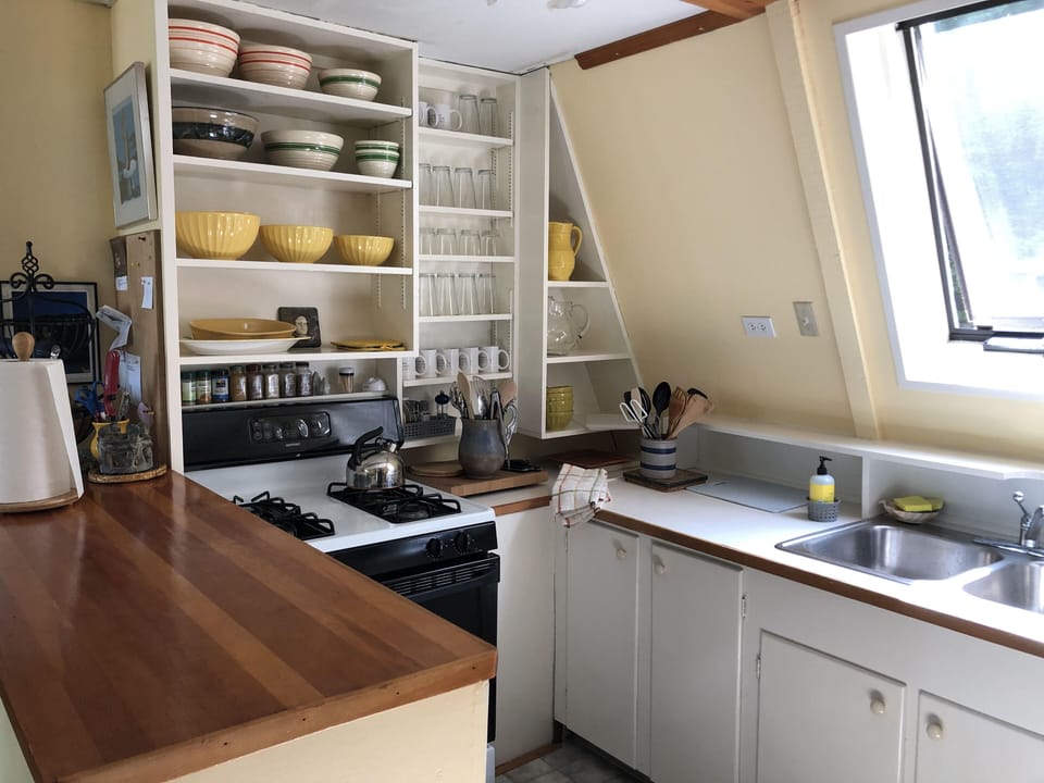 Kitchen with gas stove.
