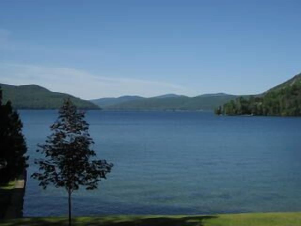view down the lake from patio - big house
