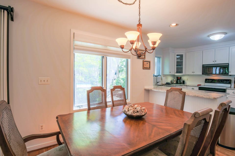 The dining room table can seat up to 6 people.